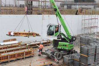 Telescopic crawler crane telecrane SENNEBOGEN 613 E structural civil engineering construction site construction crane